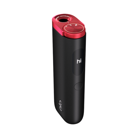 El glo™ Hyper Pro de glo™ es un dispositivo negro y rojo que presenta una tapa roja.