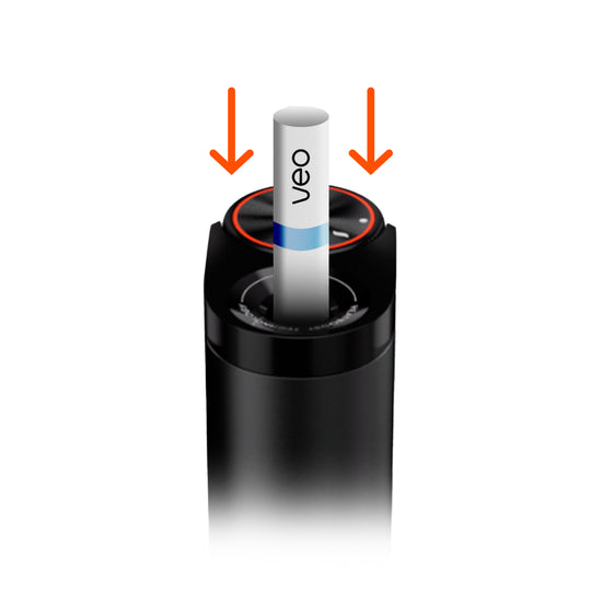 Un primer plano de un dispositivo glo™ Hyper Pro negro con un palo blanco etiquetado como "veo" insertado en el centro, y dos flechas rojas apuntando hacia abajo en el palo.