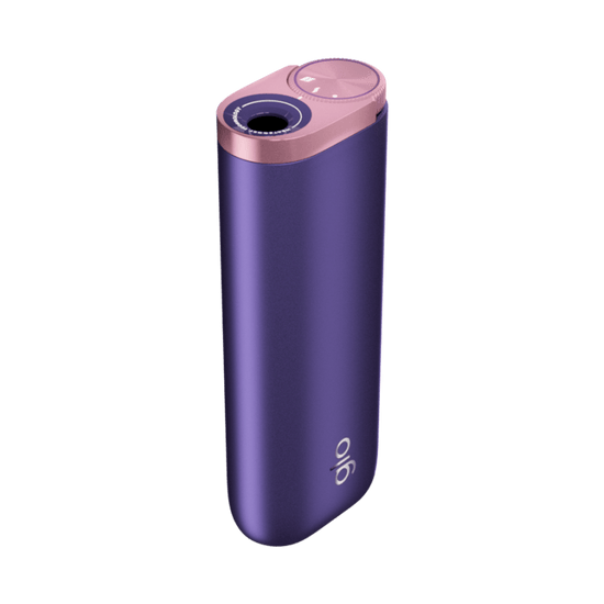 Un elegante glo™ Hyper Pro morado con bordes redondeados, una parte superior en oro rosa y el nombre de la marca glo™ impreso en la parte delantera.